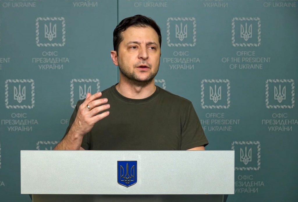 In this photo taken from video provided by the Ukrainian Presidential Press Office, Ukrainian President Volodymyr Zelenskyy speaks to the nation in Kyiv, Ukraine, Sunday, Feb. 27, 2022. Street fighting broke out in Ukraine's second-largest city Sunday and Russian troops put increasing pressure on strategic ports in the country's south following a wave of attacks on airfields and fuel facilities elsewhere that appeared to mark a new phase of Russia's invasion. (Ukrainian Presidential Press Office via AP)