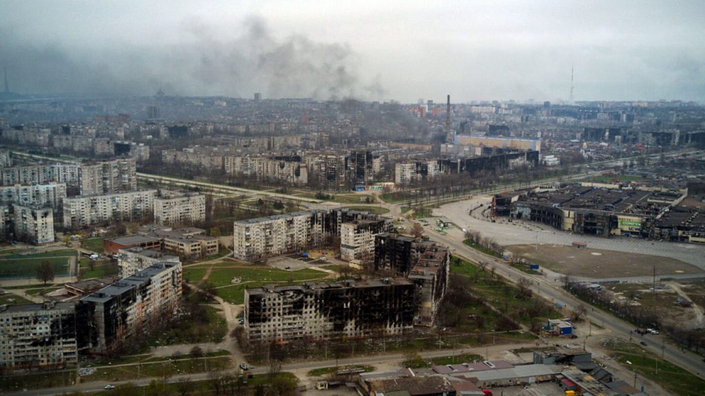 TOPSHOT - An aerial view taken on April 12, 2022, shows the city of Mariupol, during Russia's military invasion launched on Ukraine. - Russian troops on April 12 intensified their campaign to take the port city of Mariupol, part of an anticipated massive onslaught across eastern Ukraine, as the Russian president made a defiant case for the war on Russia's neighbour. (Photo by Andrey BORODULIN / AFP) (Photo by ANDREY BORODULIN/AFP via Getty Images)