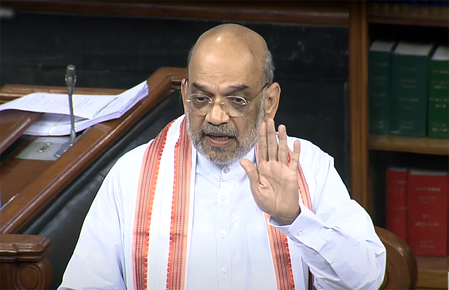 New Delhi: Union Home Minister Amit Shah speaks in the Lok Sabha during the Monsoon session of Parliament, in New Delhi, Friday, August 11, 2023. (Photo: IANS/SANSAD TV)